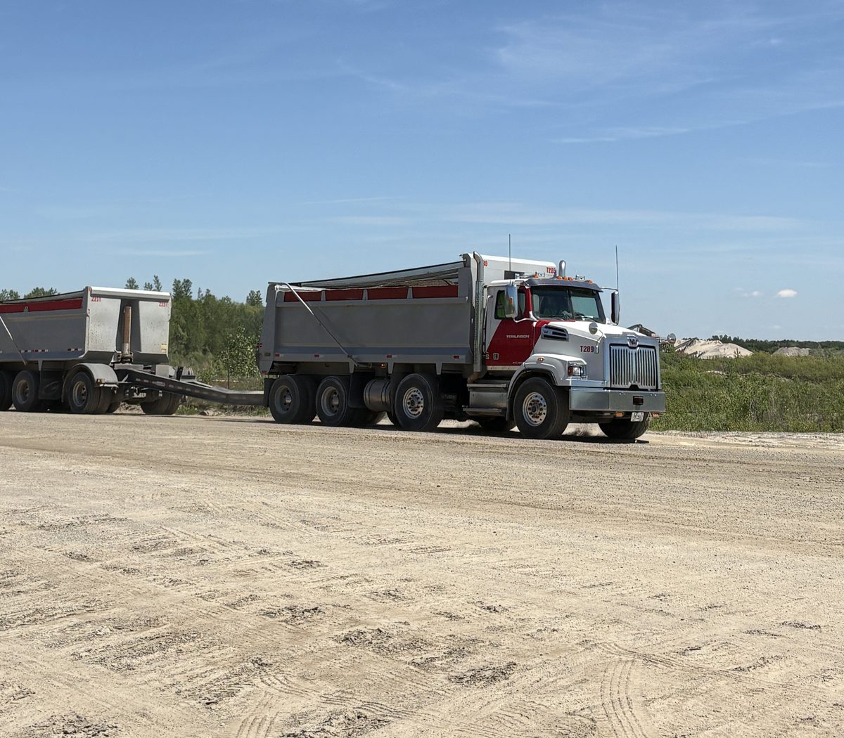 Tandem dump truck at a pit